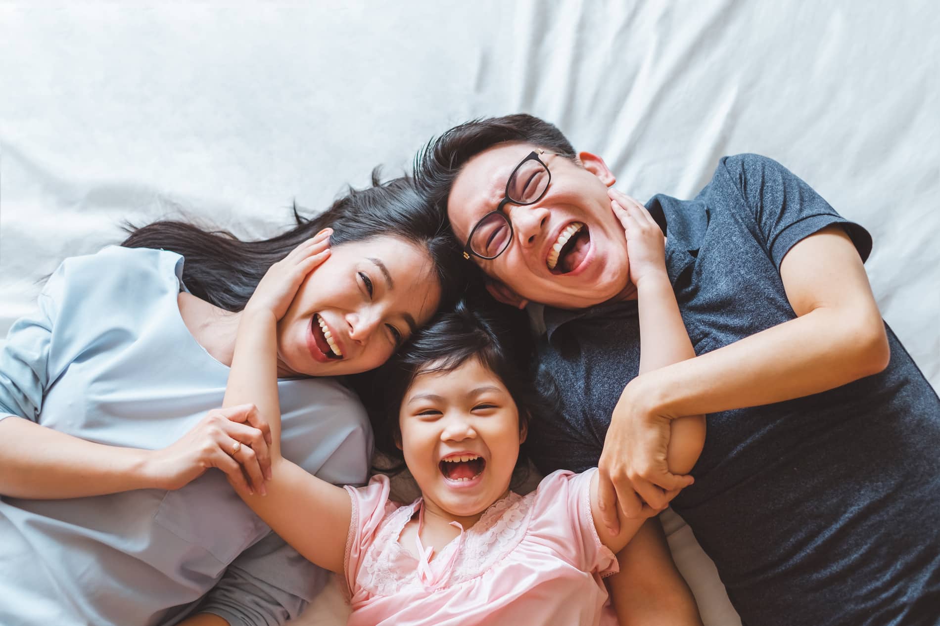 AdobeStock_261487920 v2 Family smiling after restoratice dental care in Nephi UT