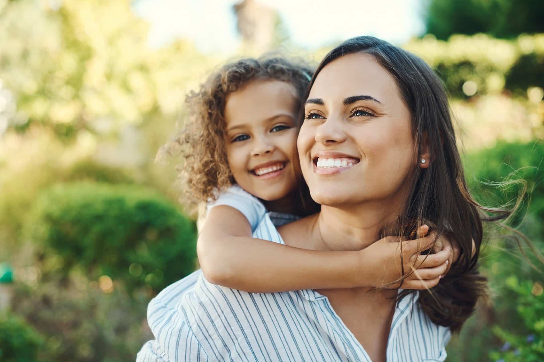 Mom and her daughter loving invisalign clear aligners from Bear Canyon Dental