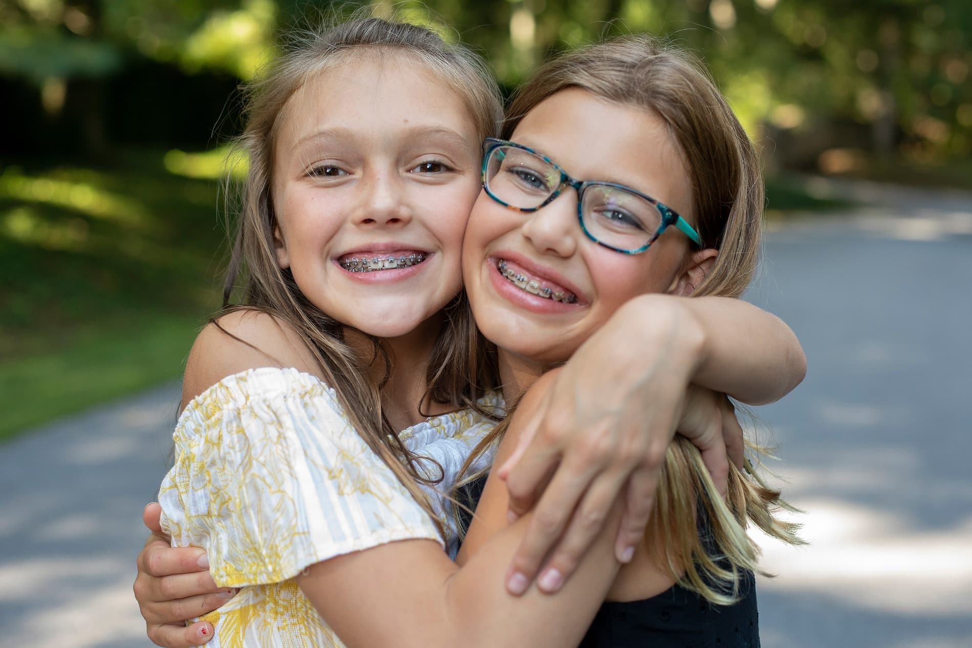 Girls hugging after getting their new dental braces in Nephi UT